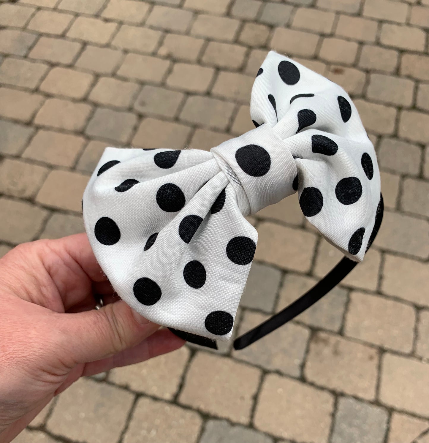 Black and white polka dot bow headband